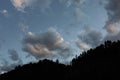 Overcast sky before rain in the mountains. clouds come up from the tops of the mountains