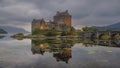 Overcast sunset light on Eilean Donan Castle on Lochalsh, Highlands, Scotland Royalty Free Stock Photo