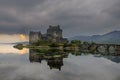 Overcast sunset light on Eilean Donan Castle on Lochalsh, Highlands, Scotland Royalty Free Stock Photo