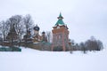 Overcast winter day at the walls of the Pyukhtitsky Assumption Monastery. Kuremae, Estonia