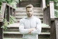 Overcome any obstacles. Sportsman lifestyle. Handsome athlete stairs background. Male beauty. Sport wellbeing and self Royalty Free Stock Photo