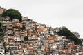 Overcrowded Favela on Hillside Next to Urban Wealth in South America