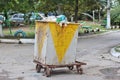 Overfilled metal dumpster