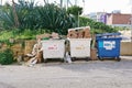 Overfilled waste containers dumpster for recycling waste plastic and paper