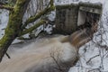 Overflow river Bystrice in Krusne mountains in winter morning