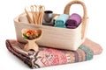 overflowing basket with yoga accessories, including mat, towel, and block