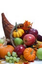 An overflowing cornucopia on a white background Royalty Free Stock Photo