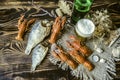 Overflowing with foam glass with beer and a bottle of beer and salted boiled red crayfish