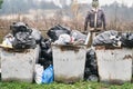 Overflowing Garbage Bins with Garbage Bags