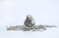 Overflowing jar of International coins on white background with copy space Royalty Free Stock Photo