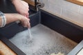 Overflowing kitchen sink, clogged drain Royalty Free Stock Photo