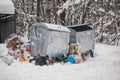 Overflowing metal containers with garbage.scattered debris,pollution of the environment