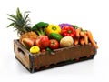 Overflowing with natures bounty. Studio shot of a box full of fresh vegetables and fruit against a white background. Royalty Free Stock Photo