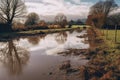 overflowing river causing field flooding