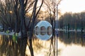 Flooded park, beach and UFO-shaped bar Royalty Free Stock Photo