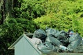Overflowing ugly trash and waste stacking up at recovery bins causing environmental hazards for the environment