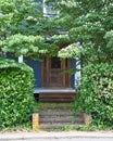 Overgrown Landscaping on Old Home Royalty Free Stock Photo