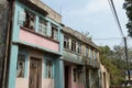 Overgrown by nature, abandoned homes on Yim Tin Tsai, an island in Sai Kung, Hong Kong Royalty Free Stock Photo