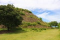 An overgrown temple on Monte Alban. Royalty Free Stock Photo