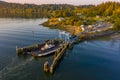 Overhead Aerial View of a Small Ferryboat docking on Lummi Island.