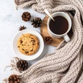 Overhead Arrangement of Chocolate Chip Cookie Coffee and Pinecones on Table Royalty Free Stock Photo