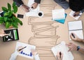 Overhead of business team with cream background and book doodle