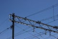 Overhead cable catenary train on a blue sky Royalty Free Stock Photo