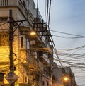 Overhead cables create a rats maze