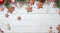 Overhead of Christmas New Year holiday background. Red gingerbread cookies boots, meetens, bag with gift, fir branch tree on white Royalty Free Stock Photo