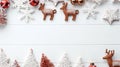 Overhead of Christmas New Year holiday background. Red gingerbread cookies elk, deer, boots, meetens, bag with gift, fir branch Royalty Free Stock Photo