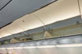 Overhead compartment in commercial airplane .( Filtered image pr Royalty Free Stock Photo