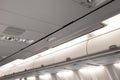 Overhead compartment row of an airplane cabin interior