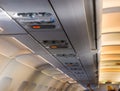 Overhead console in the passenger aircraft Royalty Free Stock Photo