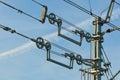 Overhead contact wires of electrified railway tracks kept under tension Royalty Free Stock Photo