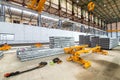 Overhead crane beam hoist concrete slab on a plant. Royalty Free Stock Photo