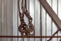 Overhead crane hooks closeup in the assembly workshop