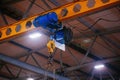 Overhead crane in the industrial building, close up Royalty Free Stock Photo