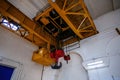 Overhead crane in the industrial building, close up Royalty Free Stock Photo