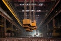 overhead crane lifting heavy metal ingots