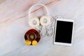 Overhead cup of black espresso coffee, tablet and headphone in marble background Royalty Free Stock Photo