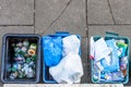 Overhead day view plastice waste refuse bins boxes on British road