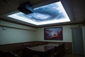 Overhead digital projector mounted on the ceiling of the boardroom