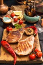 Overhead of dinner table. Assorted delicious grilled barbecue me Royalty Free Stock Photo