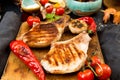 Overhead of dinner table. Delicious grilled barbecue pork meat o Royalty Free Stock Photo