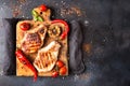 Overhead of dinner table. Delicious grilled barbecue pork meat o Royalty Free Stock Photo