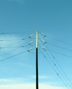 Overhead electric power distribution lines with glass insulators Royalty Free Stock Photo