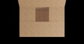 Overhead of empty brown cardboard box with lid opening on black background Royalty Free Stock Photo