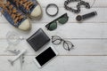 Overhead of essential accessories for travel concept background