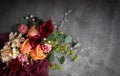 Moody Burgundy Flat Lay Floral Bouquet against gray background