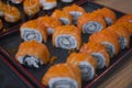 Overhead japanese sushi food. Maki ands rolls with tuna, salmon, shrimp, crab and avocado. Top view of assorted sushi, all you can Royalty Free Stock Photo
